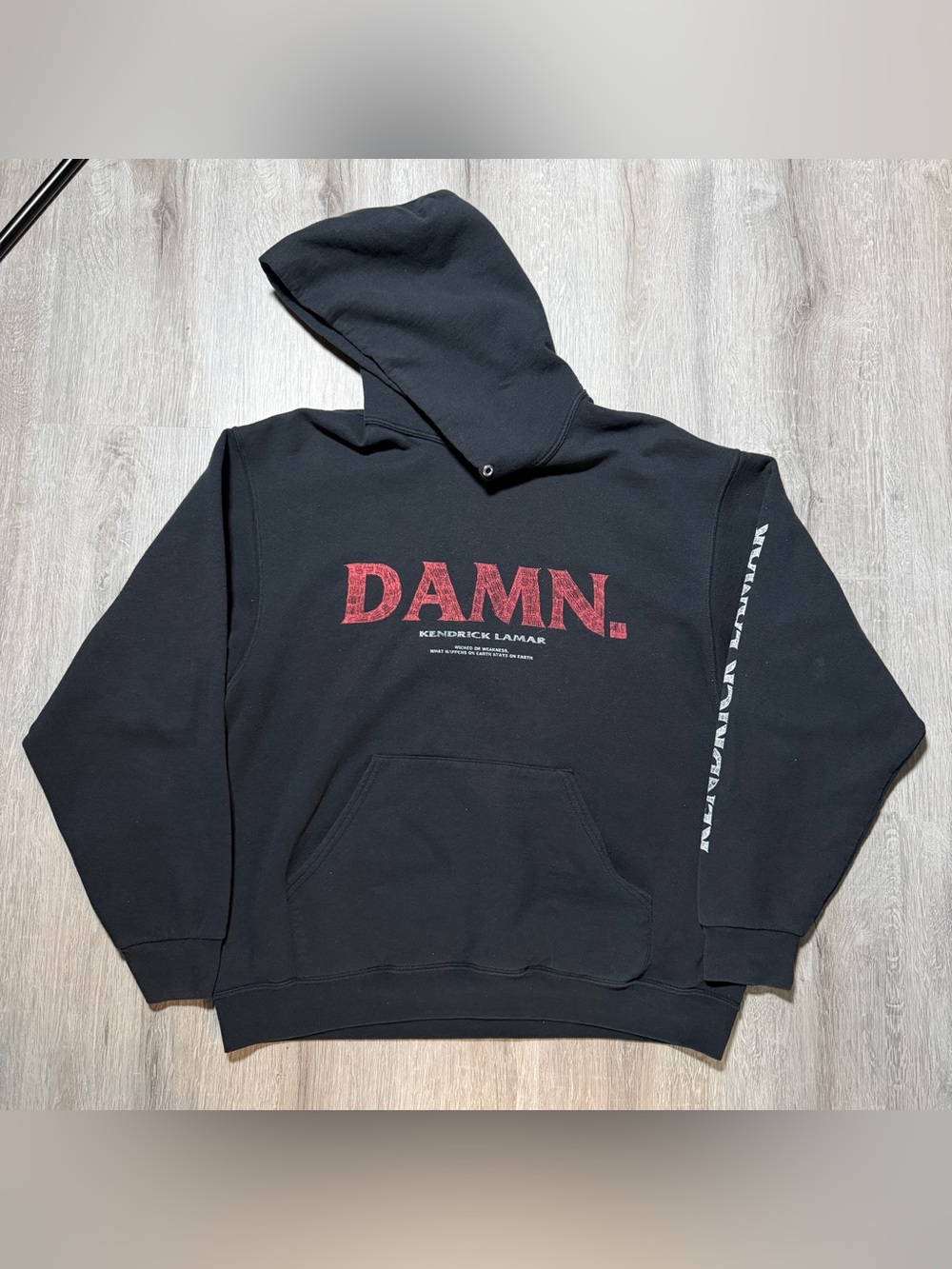 Black Hoodie with Red DAMN. Chest Graphic